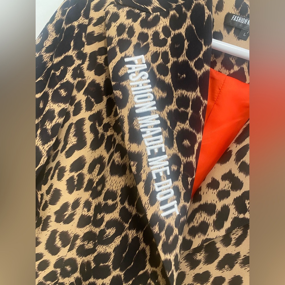 Leopard Print Jacket with Red inside Lining. 
Beautiful cinched waist fit - Picture 3 of 8